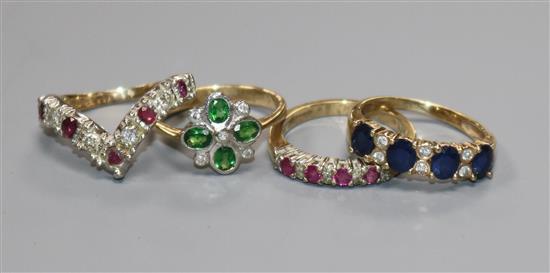Four assorted 9ct gold and gem set rings.